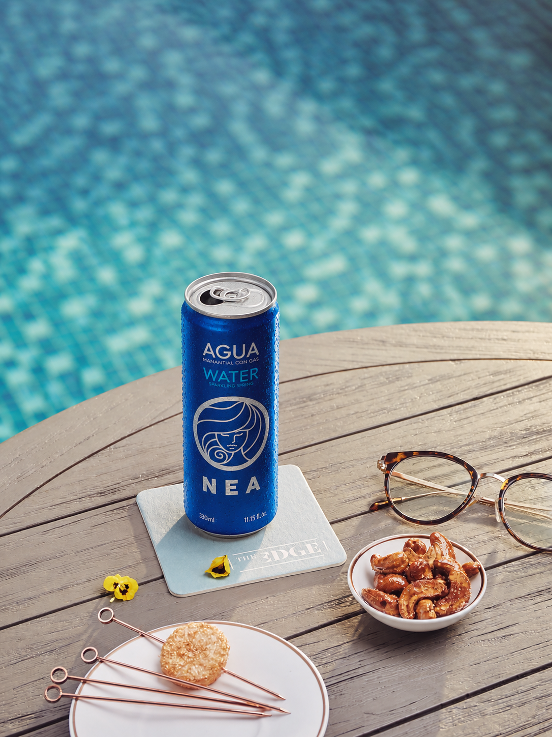 Pack abierto NEA agua con gas 33cl, 24 latas aluminio reciclable listas para servir